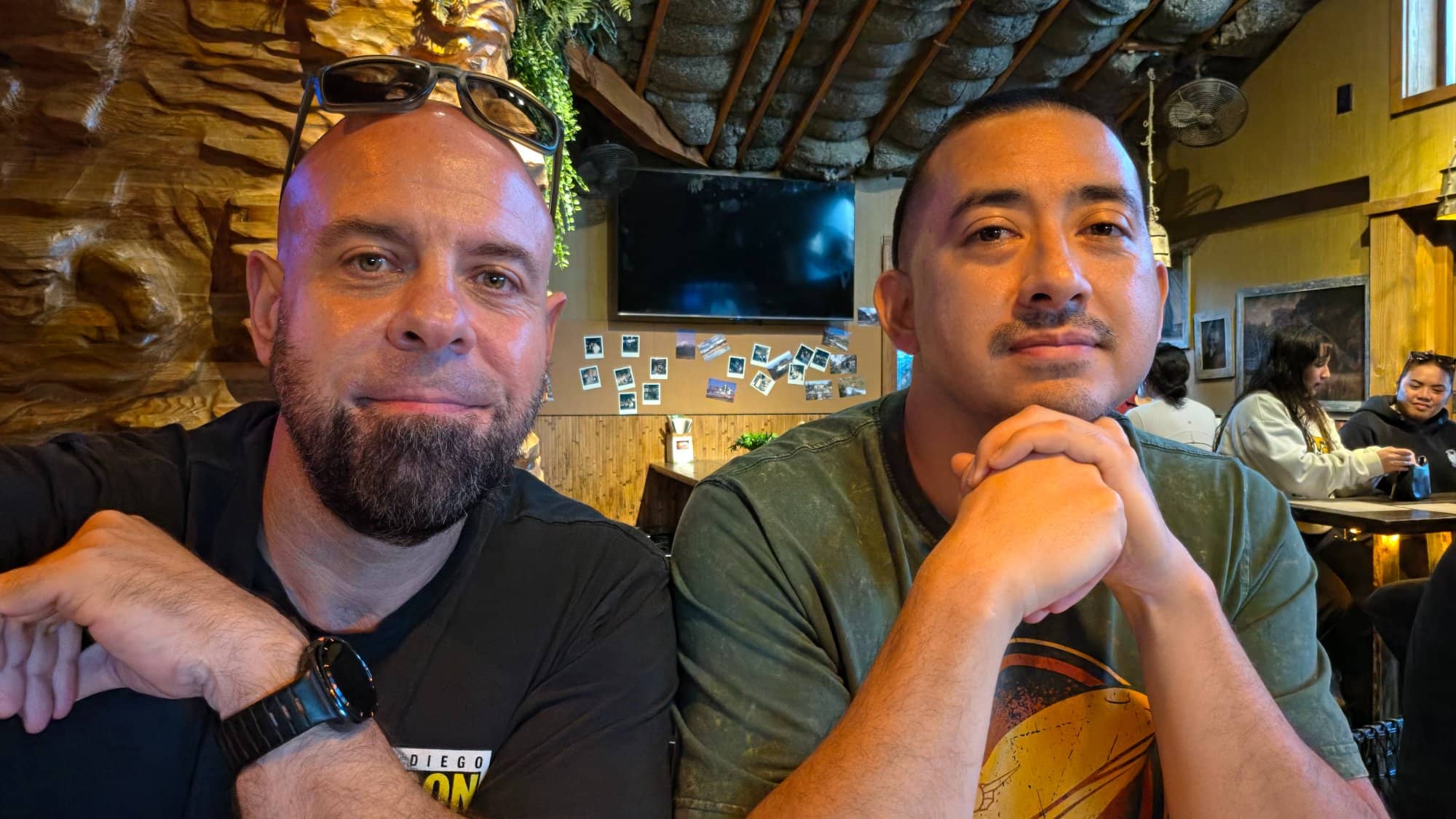 Rob and Patrick at Dunedin New Zealand Eats in San Diego — both wearing Comic-Con shirts, naturally